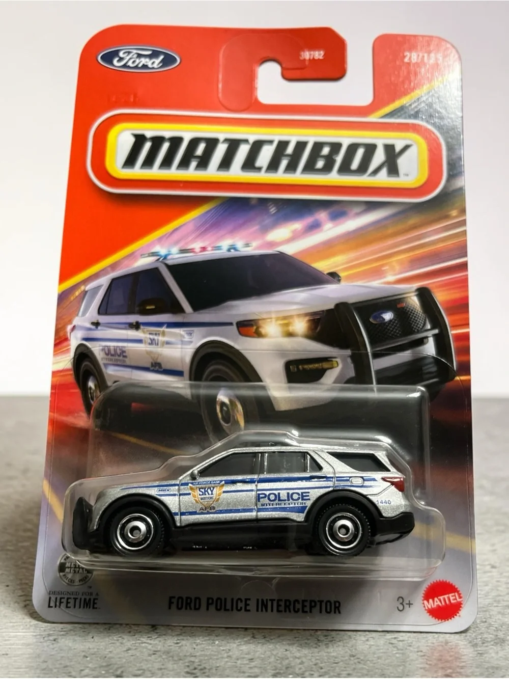 Matchbox Ford Police Interceptor Toy Car - Silver and Blue